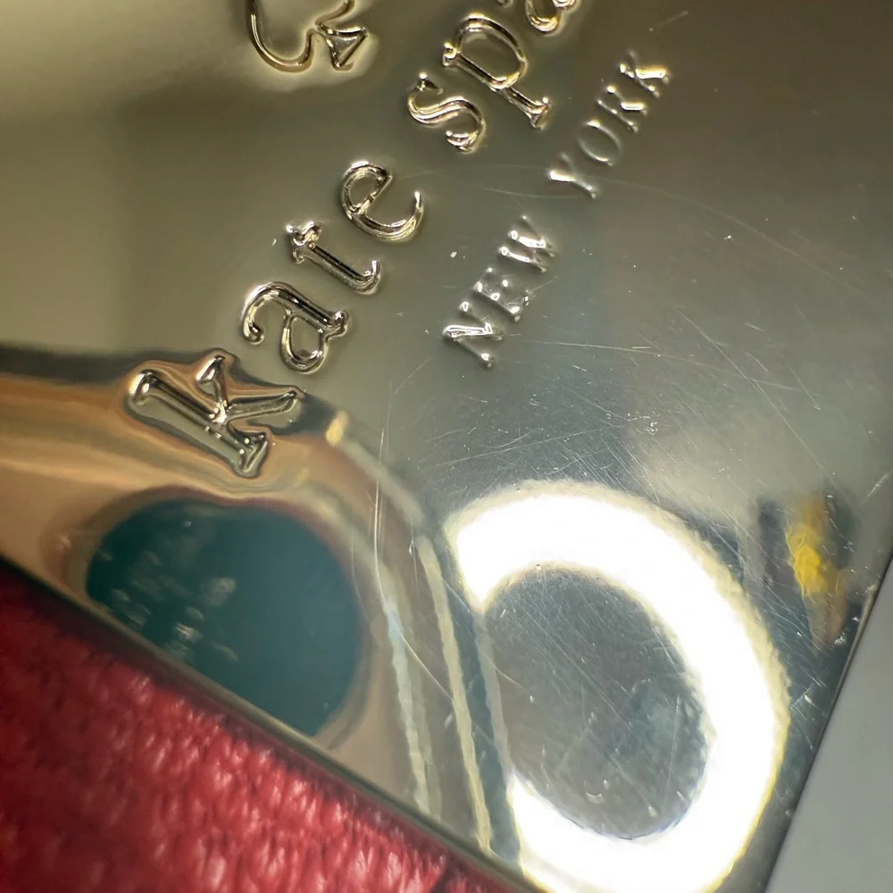 Kate Spade Silver and Red Detail
